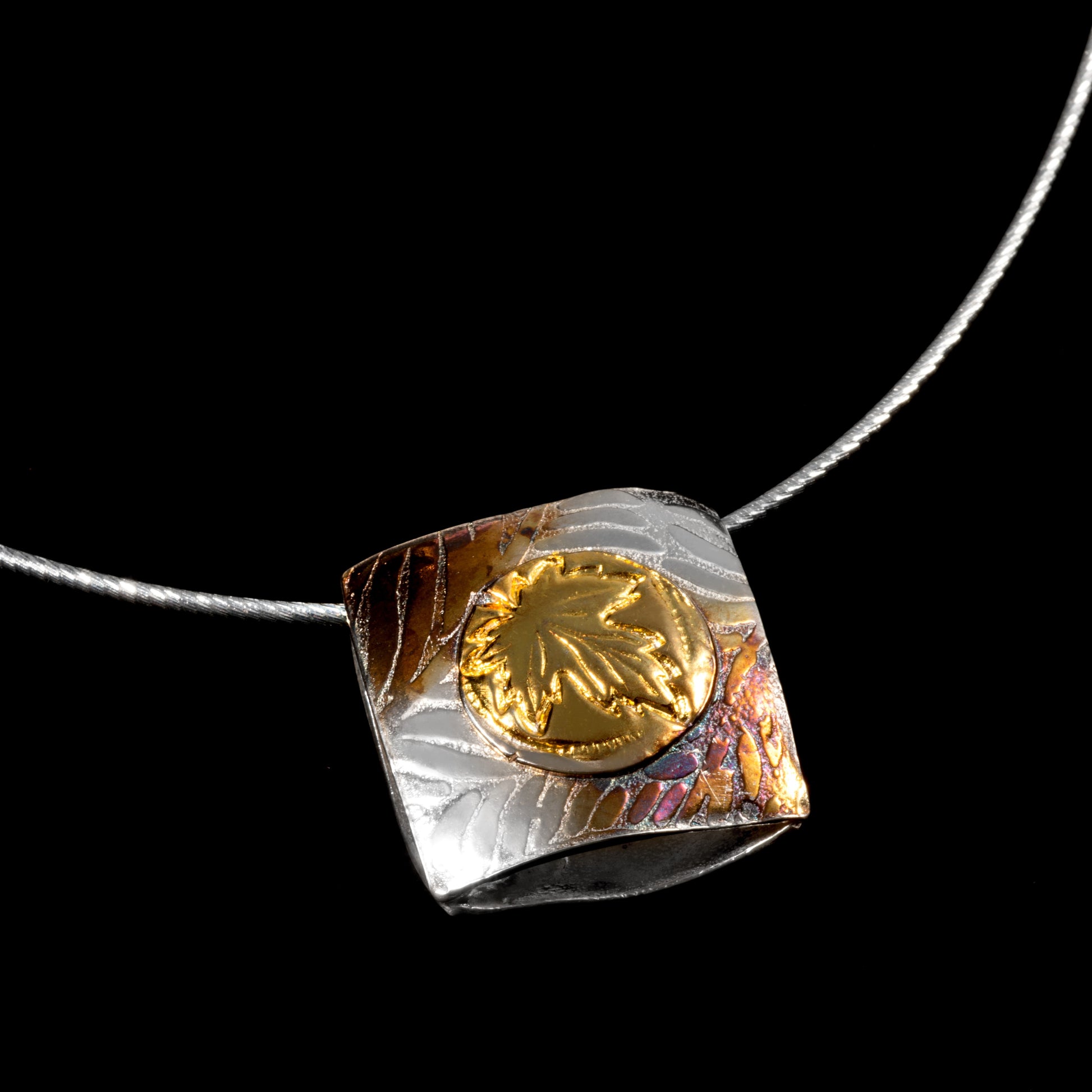 Double sided pendant maple leaf