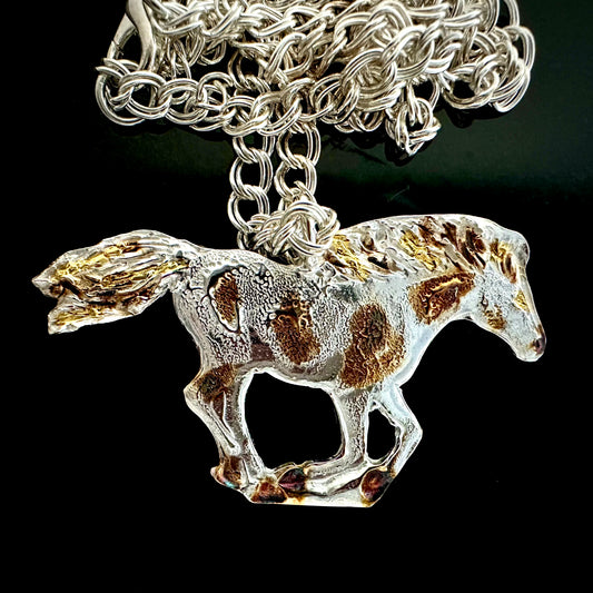 Silver And Gold Galloping Horse