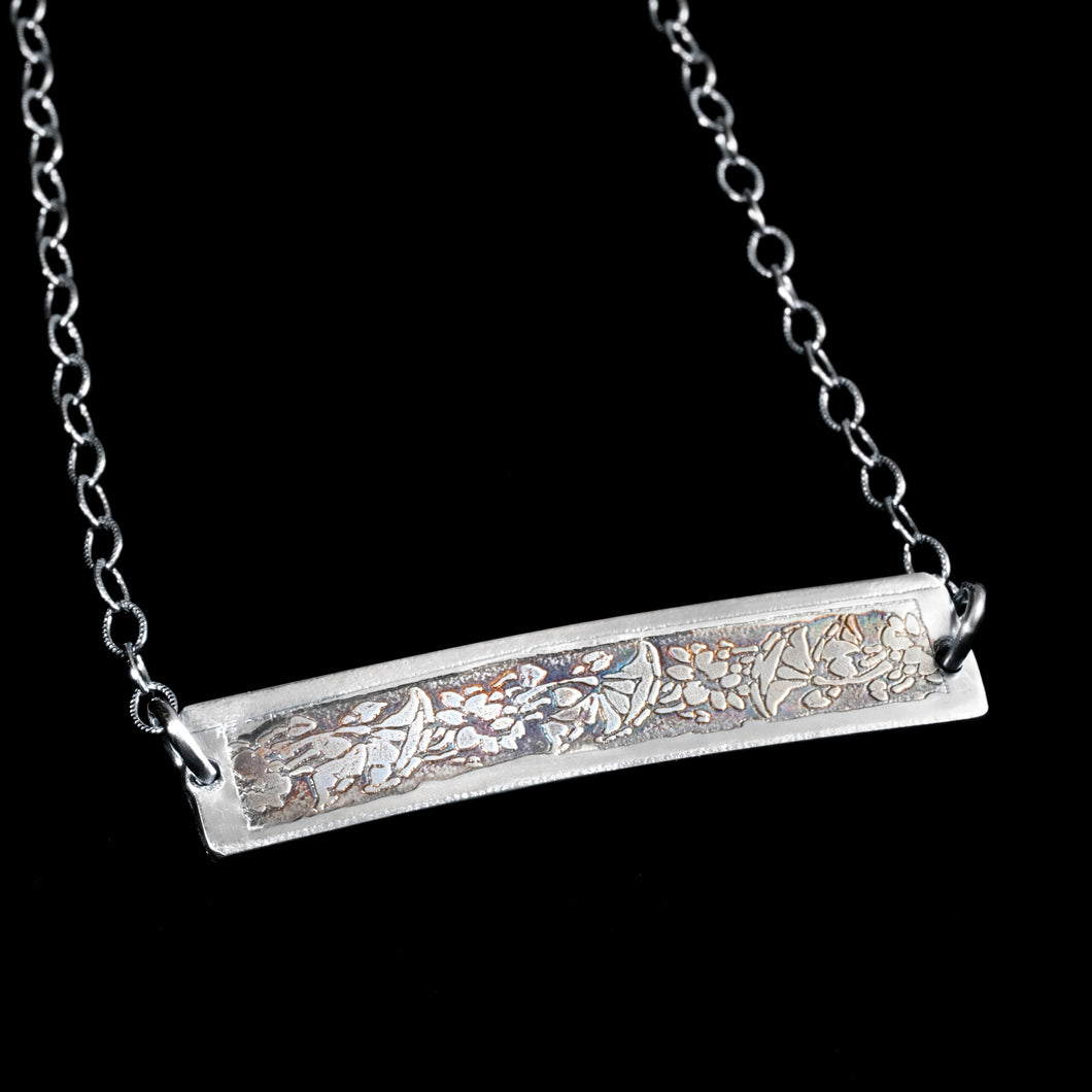 Etched sterling silver pendant floral design